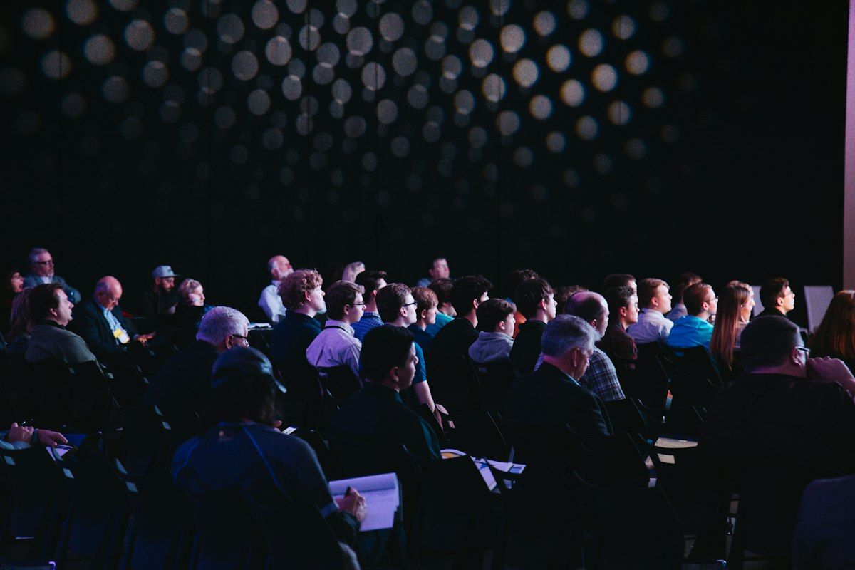 A conference hall set for an audience